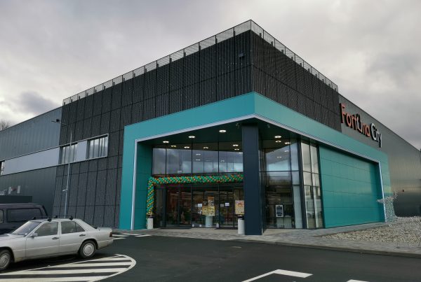 Modern commercial building facade made with Flaminio XS expanded metal mesh