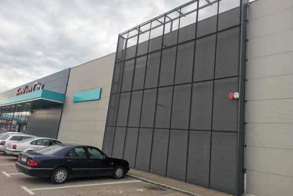 Ventilated facade with expanded metal mesh in dark finish – Fortuna Shopping Center Brčko